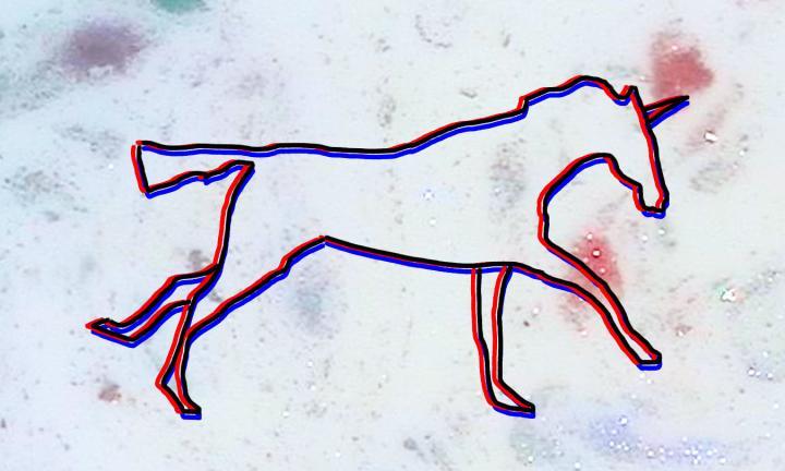 outline of a unicorn on a glittery white background