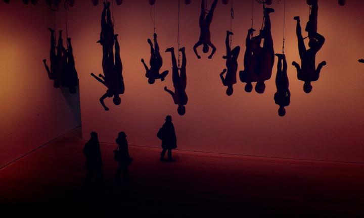 circus people hanging upside down 