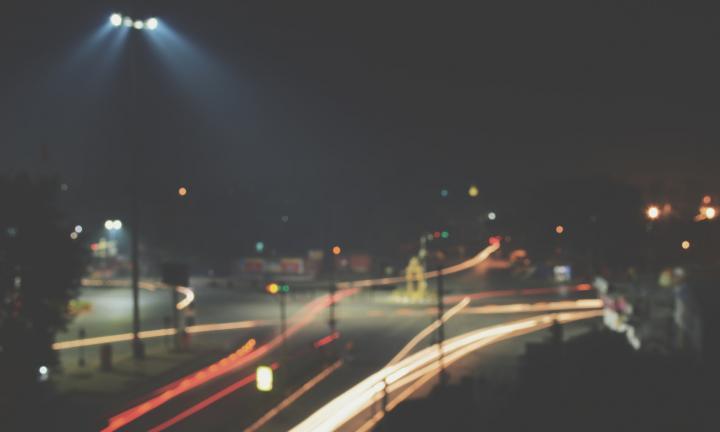 street scene at night car lights