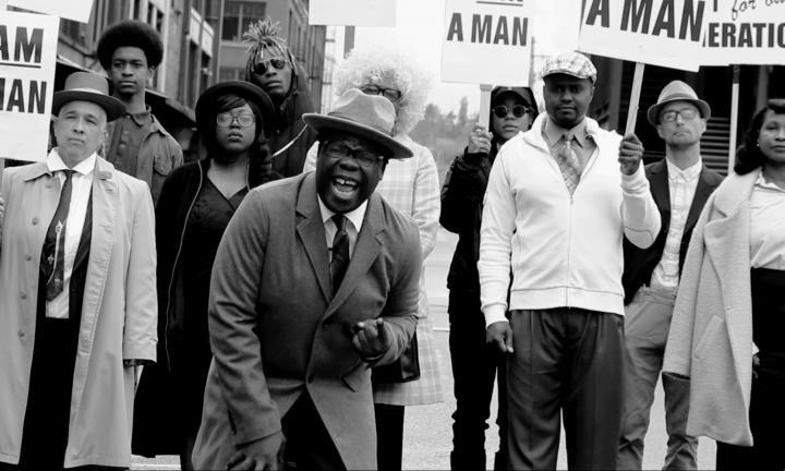 protestors with signs reading I Am a Man, still Emmett til de remix Midwest Video Poetry Fest
