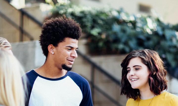 Teens talking and smiling